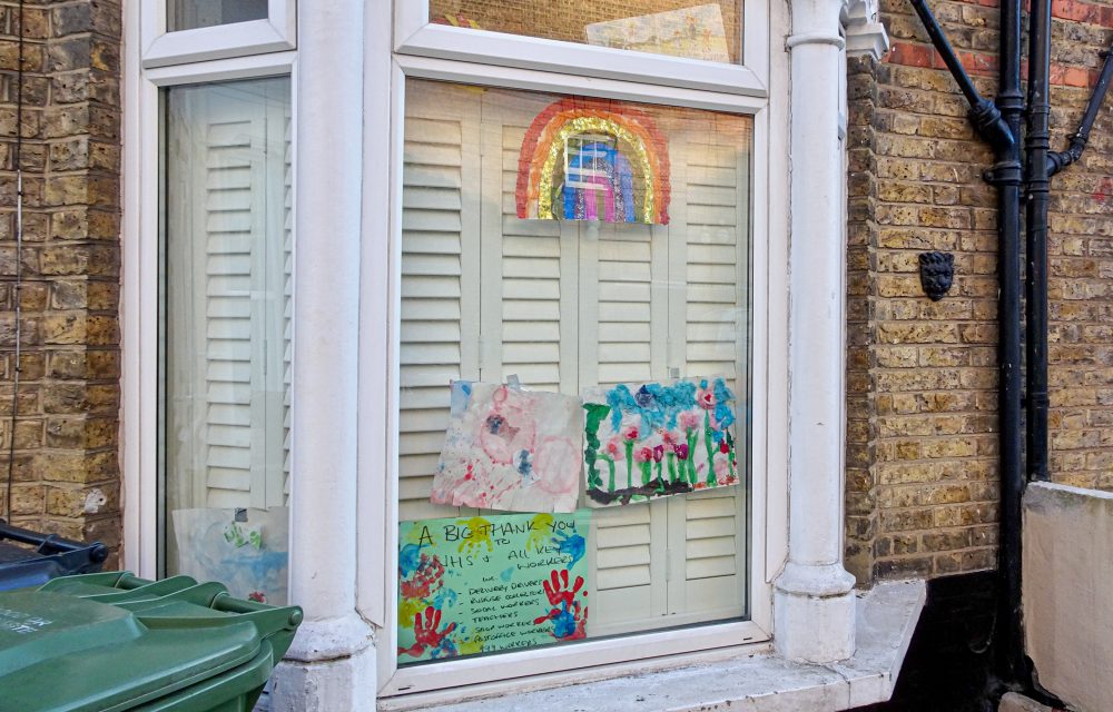 Ground floor window with children's paintings