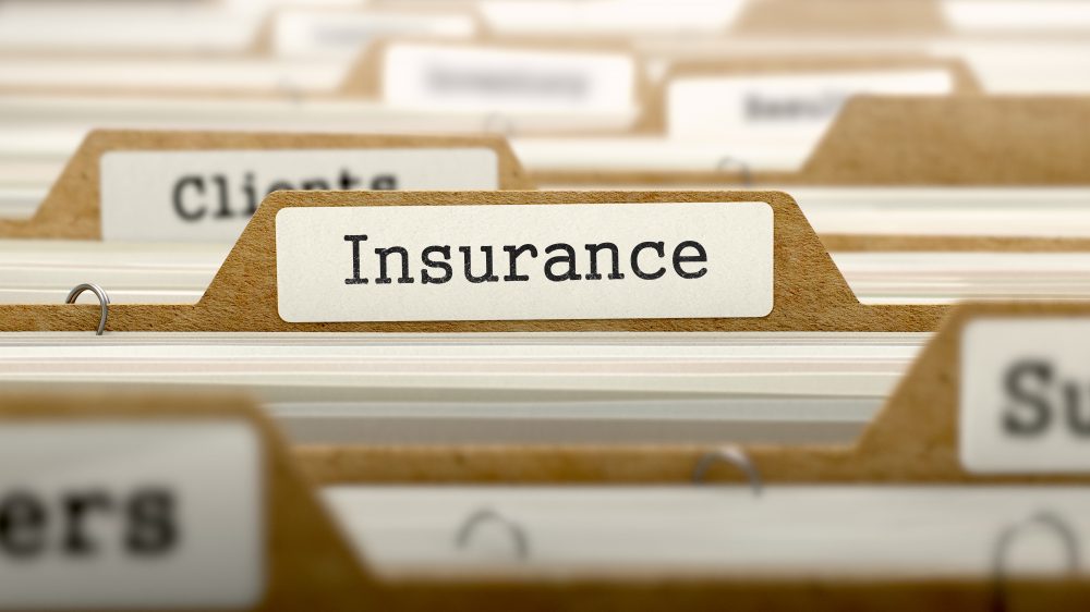 Image of file dividers with one which shows the word 'insurance' being in focus.