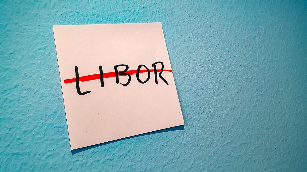 Sticky note with LIBOR crossed out in red