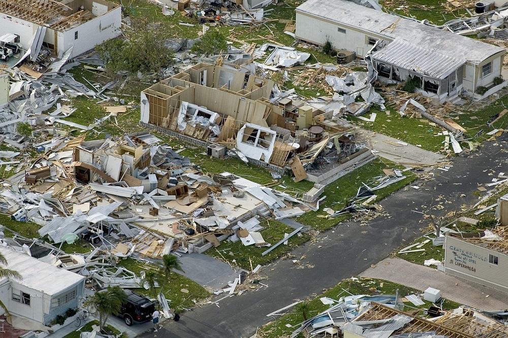 Smashed up houses and debris left in the aftermath of a hurricane.